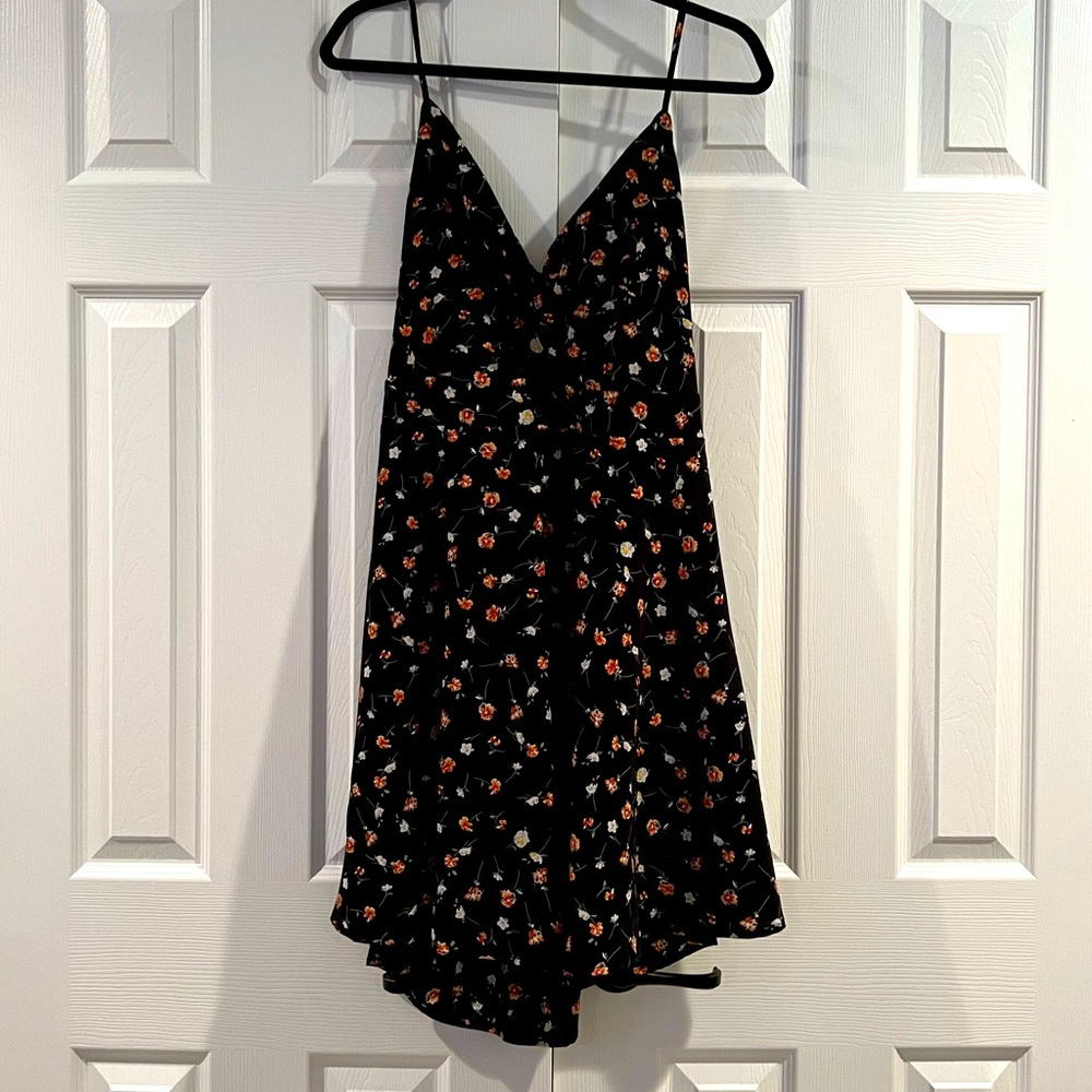 Black spring/summer dress flower pattern. Tie back stretchy. Adjustable straps